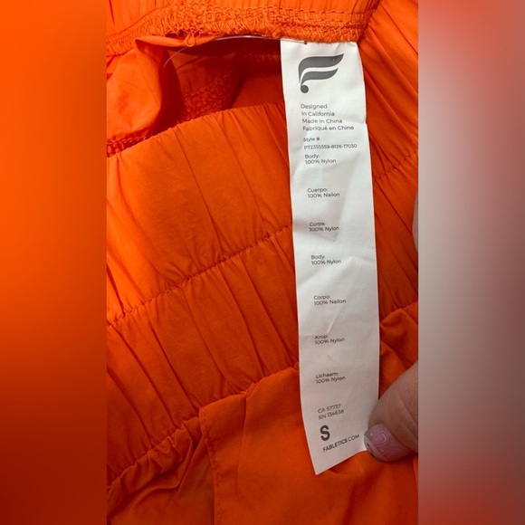 NWT Fabletics High-Waisted Piped Nylon Pant in Passion Orange - Picture 12 of 12